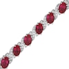 Thumbnail Image 0 of Oval-Cut Lab-Created Ruby & Round-Cut White Lab-Created Sapphire S-Curve Bracelet Sterling Silver 7.5”