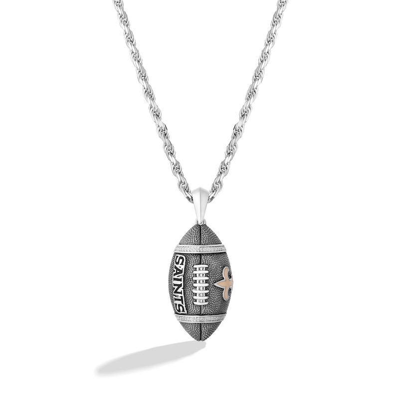 Main Image 1 of True Fans New Orleans Saints 1/20 CT. T.W. Diamond Vertical Football Necklace in Sterling Silver