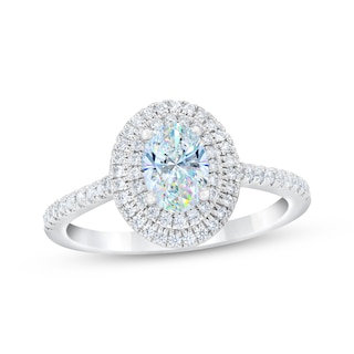 1.07 cttw. Oval Diamond Ring with Small Trio Side Diamonds Size 5.5