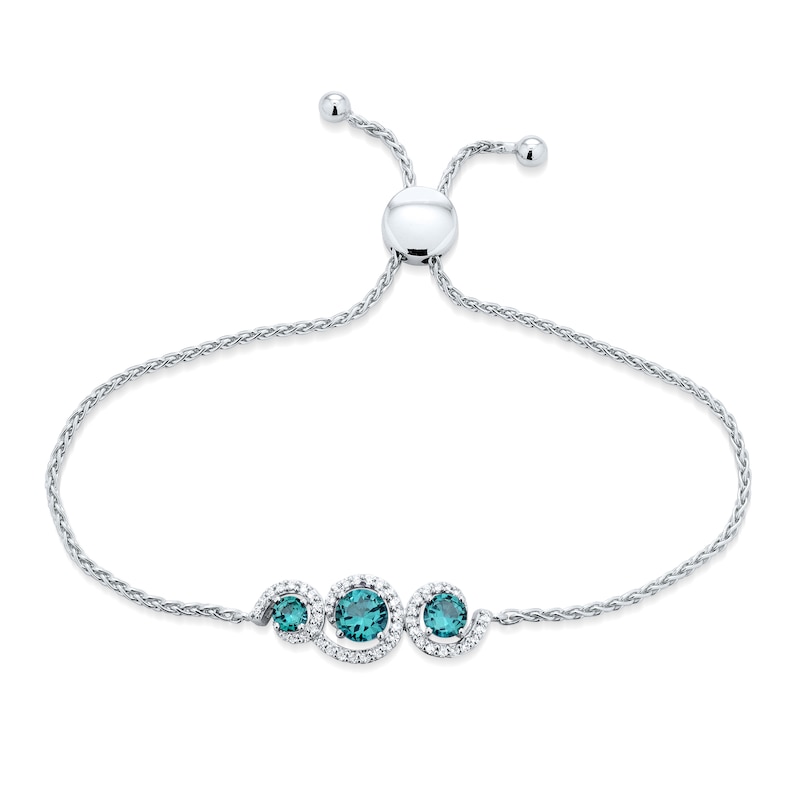 Main Image 1 of Oceanic Blue Topaz & White Topaz 3-Stone Bolo Bracelet Sterling Silver