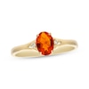 Thumbnail Image 0 of Oval-Cut Mexican Fire Opal & Diamond Accent Ring 10K Yellow Gold