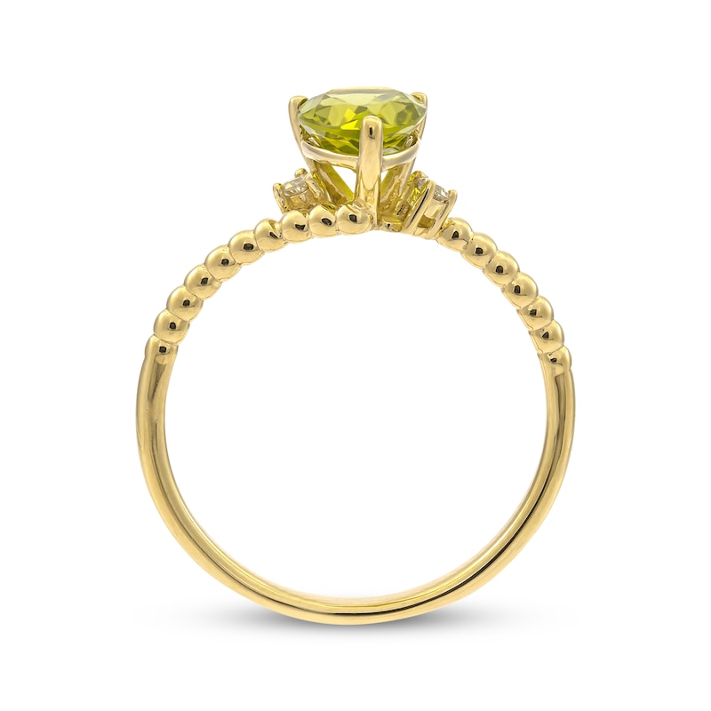 Main Image 2 of Pear-Shaped Peridot & Round-Cut Diamond Bypass Ring 1/20 ct tw 10K Yellow Gold