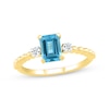 Thumbnail Image 1 of Emerald-Cut Swiss Blue Topaz & White Lab-Created Sapphire Ring 10K Yellow Gold