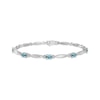 Thumbnail Image 0 of Oval-Cut Swiss Blue Topaz & White Lab-Created Sapphire Link Bracelet Sterling Silver 7.25"