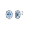 Thumbnail Image 1 of Oval-Cut Swiss Blue Topaz & White Lab-Created Sapphire Halo Stud Earrings Sterling Silver