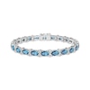 Thumbnail Image 0 of Oval-Cut Swiss Blue Topaz & White Lab-Created Sapphire Bracelet Sterling Silver 7.5"