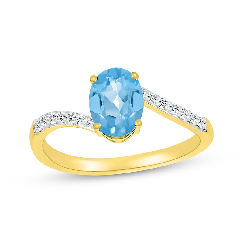 Main Image 1 of Oval-Cut Swiss Blue Topaz & Diamond Bypass Ring 1/10 ct tw 10K Yellow Gold