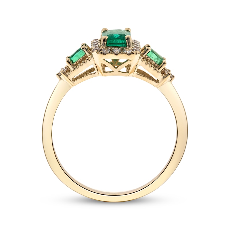 Main Image 2 of Emerald-Cut Natural Emerald & Diamond Halo Three-Stone Ring 1/5 ct tw 10K Yellow Gold