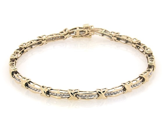 Previously Owned Diamond Crossover Link Bracelet 1-1/6 ct tw 10K Yellow Gold 8"