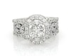 Thumbnail Image 1 of Previously Owned Multi-Diamond Center Oval Halo Bridal Set 1-1/3 ct tw 14K White Gold Size 5.75