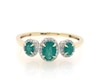 Thumbnail Image 0 of Previously Owned Three-Stone Emerald & Diamond Ring 1/8 ct tw Oval, Round-Cut 10K Yellow Gold