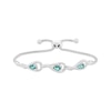 Thumbnail Image 1 of Pear-Shaped Oceanic Blue Topaz & White Lab-Created Sapphire Bolo Bracelet Sterling Silver