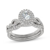 Thumbnail Image 1 of THE LEO First Light Diamond Oval-Cut Double Halo Bridal Set 7/8 ct tw 14K White Gold