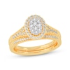 Thumbnail Image 1 of Round-Cut Multi-Diamond Center Oval-Frame Bridal Set 1/2 ct tw 10K Yellow Gold